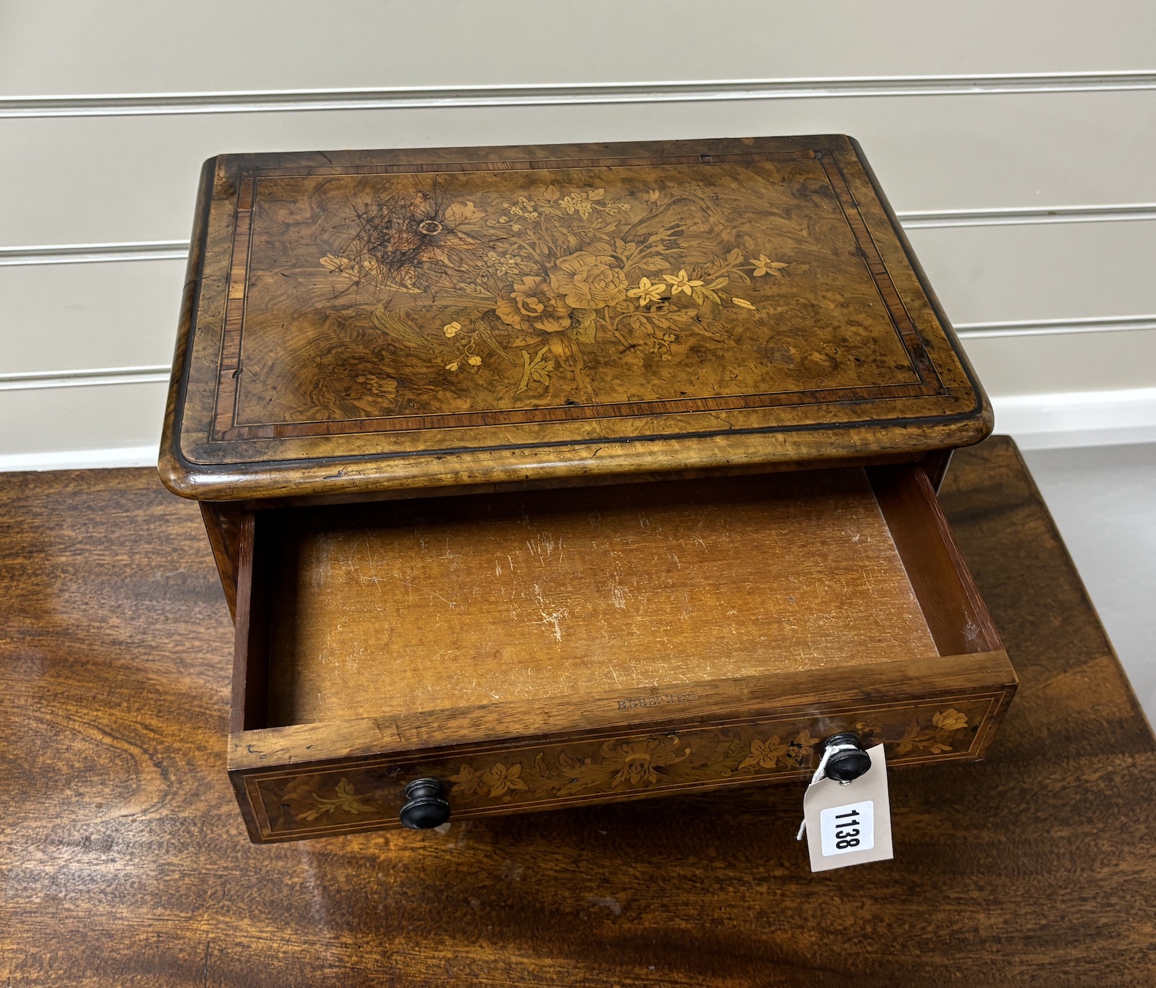 A Victorian floral marquetry inlaid miniature walnut chest, stamped 1863, B Shepherd, width 35cm, depth 24cm, height 27cm